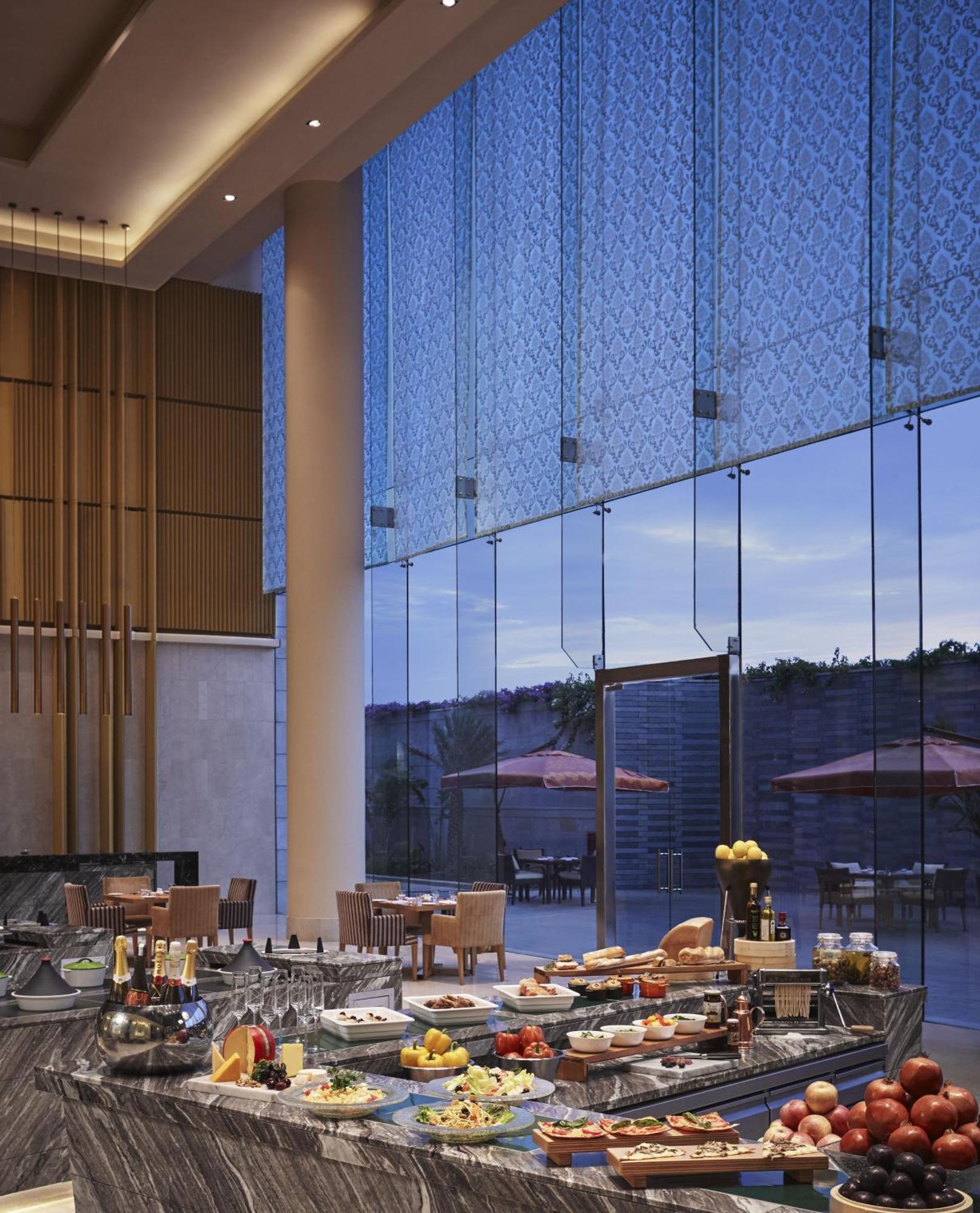 ทัช บังกะลอร์ Hotel Devanahalli ภายนอก รูปภาพ The interior of the restaurant