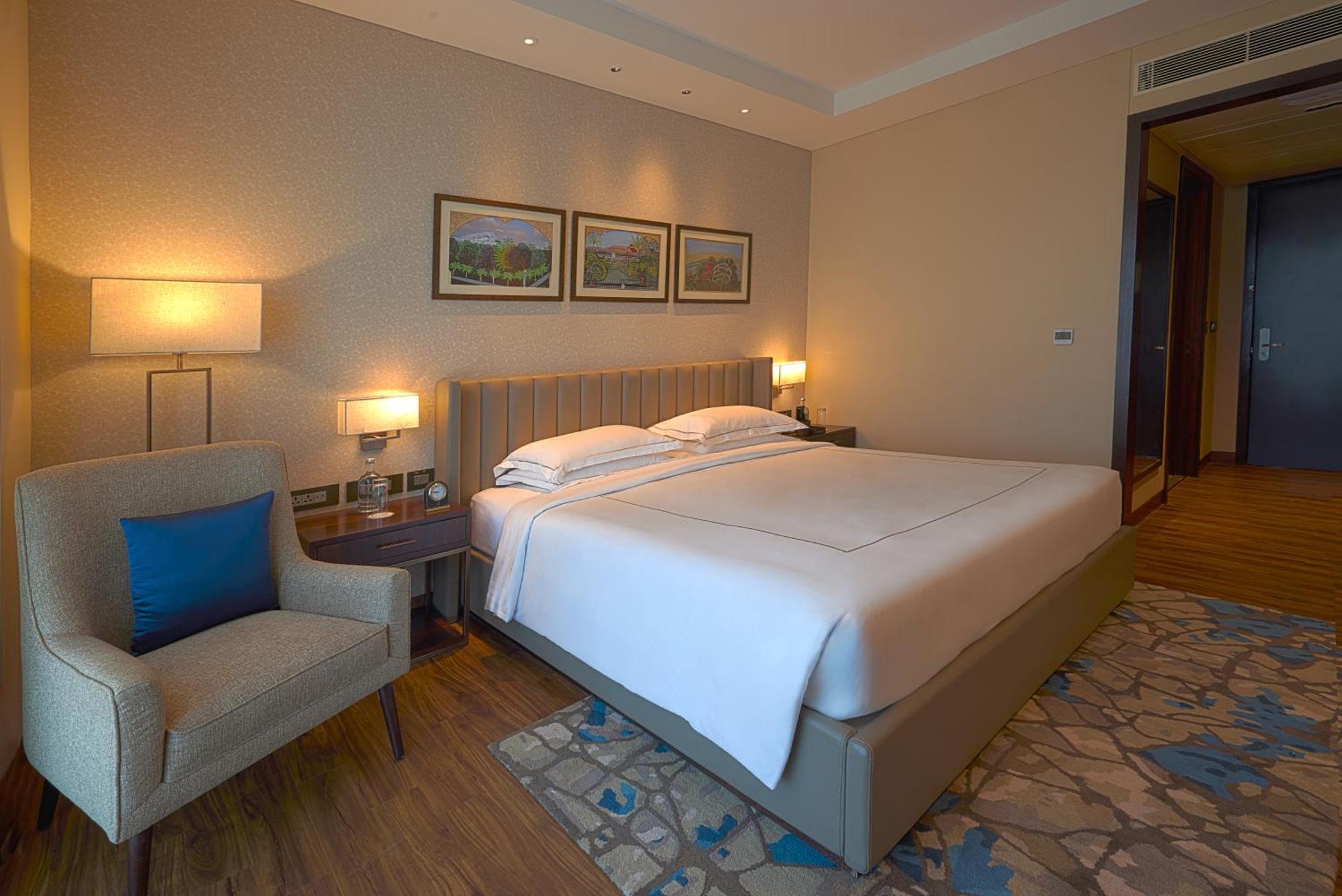 ทัช บังกะลอร์ Hotel Devanahalli ภายนอก รูปภาพ A bedroom at the hotel
