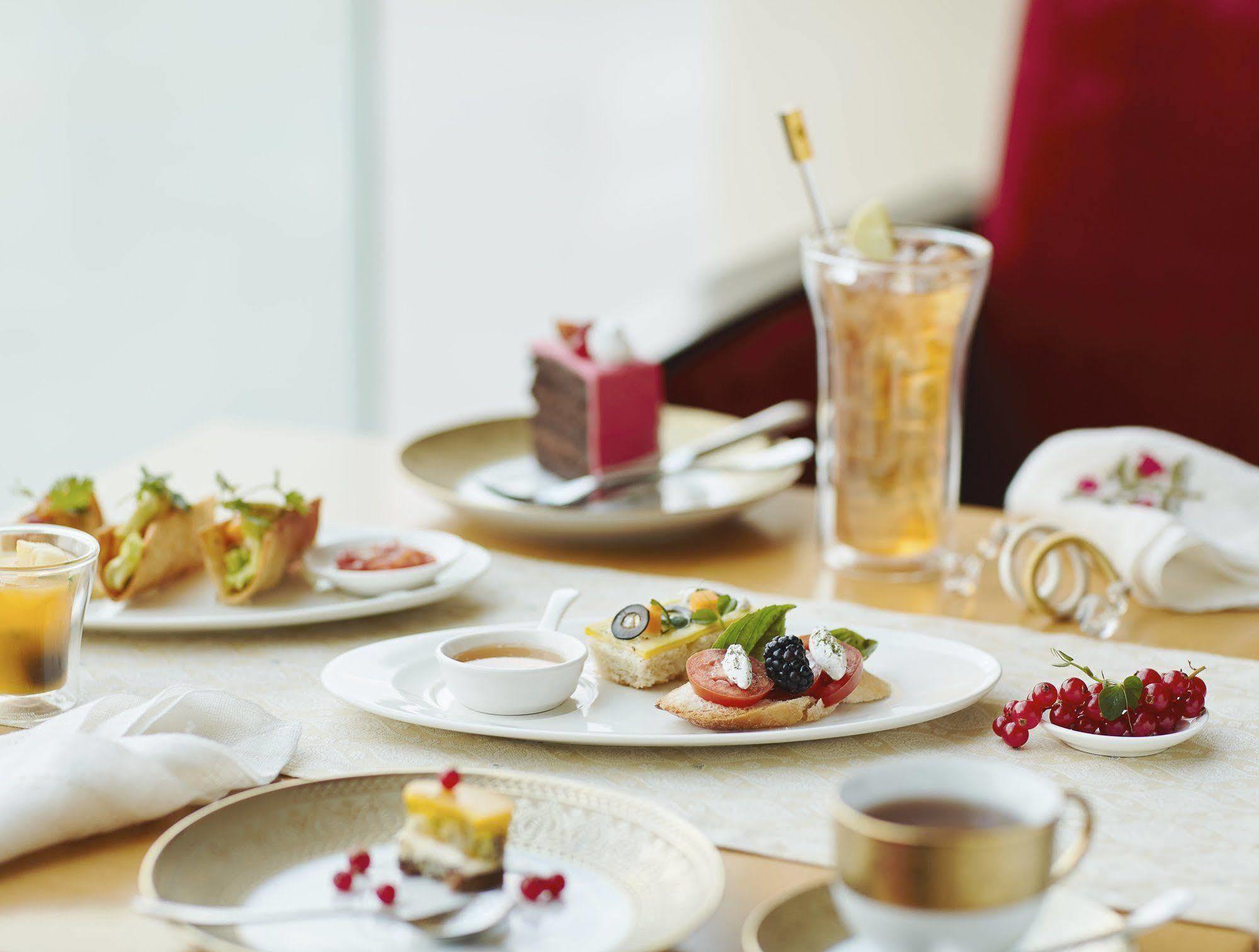ทัช บังกะลอร์ Hotel Devanahalli ภายนอก รูปภาพ A typical afternoon tea